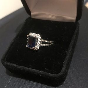 14k white gold Sapphire ring with a halo